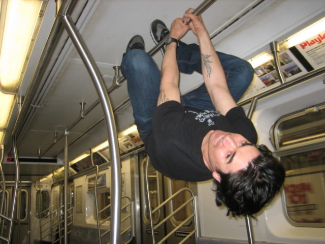 mike upside down in nyc subway