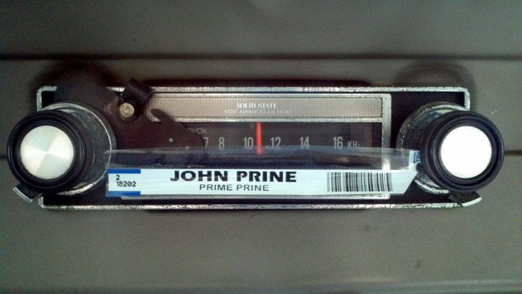 john prine label on am radio dial in falcon