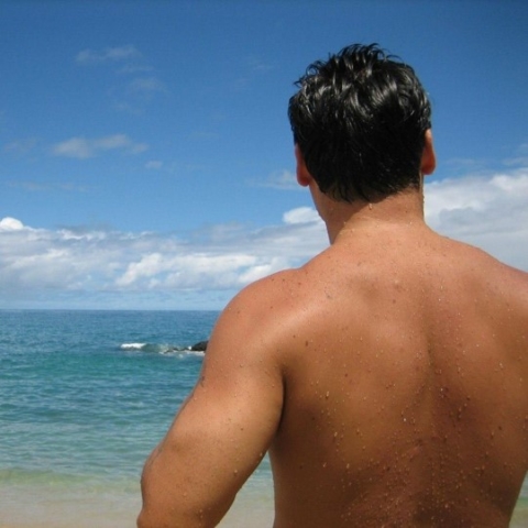 back of mike looking at ocean in hawaii