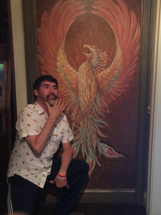 mike contemplating a painting of the phoenix in 2018